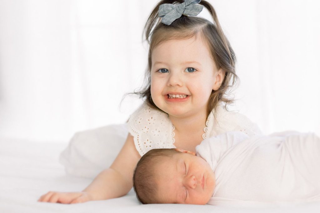Family photographer in rolla Missouri has a studio with outfits for children, mothers, and newborns