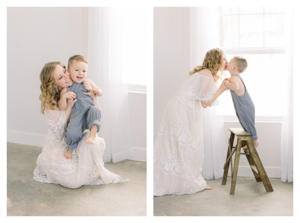 Haven Hill Studios photoshoot in white studio in Sullivan Missouri of mommy and toddler in white lace dress and blue overalls. 